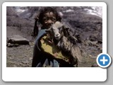 Girl with goat and glacier